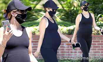 Katherine Schwarzenegger puts her bump on display on daily walk