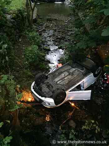 Woman driver arrested after car plunges 15ft into river in Barrow Bridge