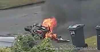 Moment 'stolen' motorbike bursts into flames in city street
