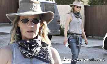 Helen Hunt, 56, is a chic hiker as she sports a hat, sunglasses and handkerchief