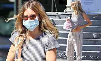 Sienna Miller cuts a casual figure to pick up   Dunkin' Donuts in NYC