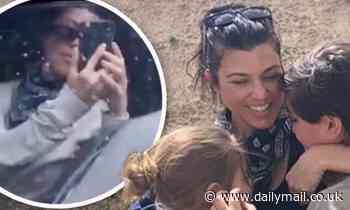 Kourtney Kardashian shares cute snap hugging her kids as visits hot springs in Montana