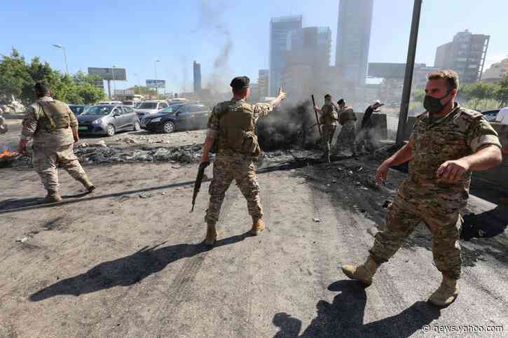 Lebanon protesters burn roads, clash with security in second night of unrest