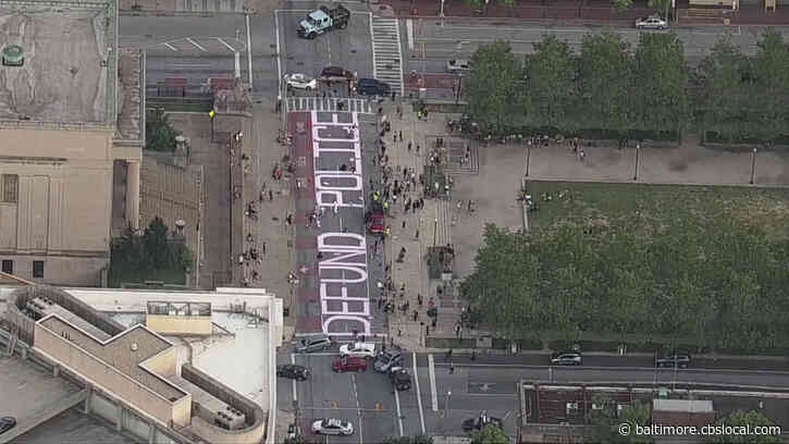 Protesters March In Downtown Baltimore; Paint ‘Defund Police’ On Gay Street Outside City Hall