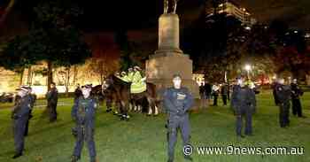 Police warn against Sydney protests after keeping guard around Captain Cook statue in Hyde Park - 9News