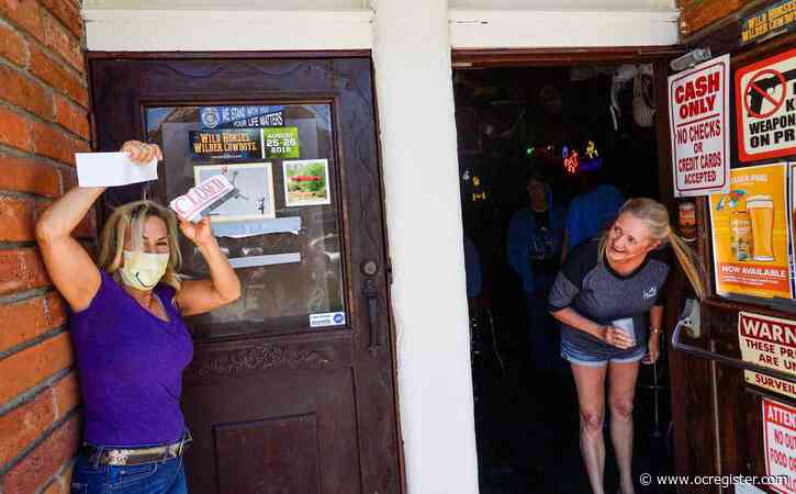 Orange County residents embrace reopening of bars, gyms and pools