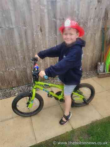Boy from Astley Bridge raises money for fire service following moors fires
