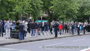 Hundreds gather to protect war memorials outside Belfast City Hall