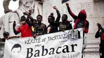 Shops close, monuments shielded as protests against police violence held around the world