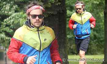 Harry Styles debuts his new lockdown facial hair as he heads out for a run