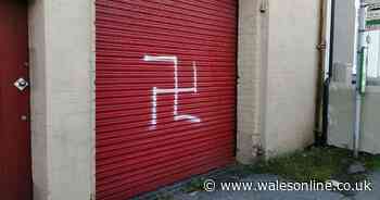 Swastika painted outside black family's Welsh home