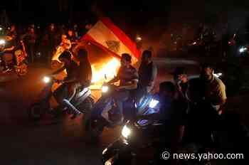 Lebanese protesters shut down roadways with fires as currency collapses