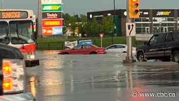 Tornadoes touch down in southern Alberta, as floods and tennis ball-sized hail hit Calgary