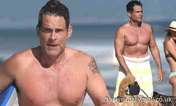 Rob Lowe, 56, goes shirtless while getting wet and wild in Santa Barbara with son Matthew