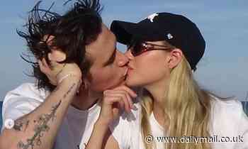 Brooklyn Beckham and Nicola Peltz model his mother Victoria's Pride T-shirts