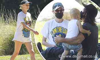 Diane Kruger puts on a leggy display during park day with Norman Reedus and their daughter