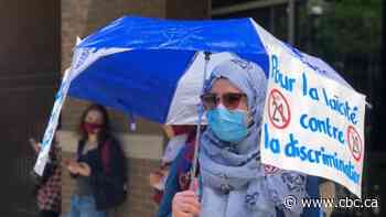 Protesters gather to oppose religious symbols ban, one year after Bill 21 became law
