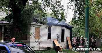 Saskatoon firefighters battle flames at boarded-up house Sunday afternoon