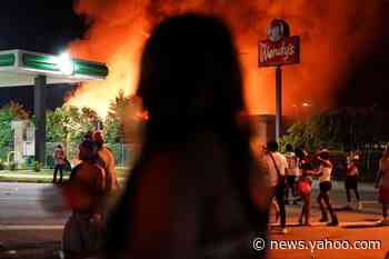Atlanta police seek masked woman suspected of burning down Wendy's