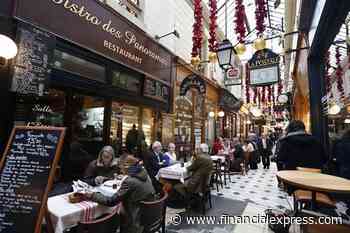 Covid-19: What virus? Parisians pack cafes as city gets its magic back
