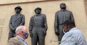 Gov. Tim Walz visits site of Duluth lynchings exactly 100 years later