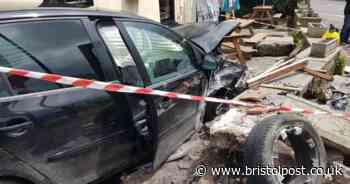 Dad tried to outrun police and smashed into pub with kids in back