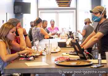 A table for who? Diners still a bit leery of venturing out