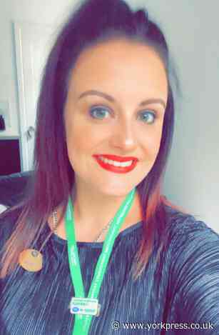 York woman claims volunteer prize from Macmillan