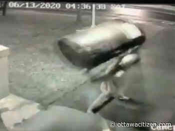 Garbage barrel hurled through glass door of Winchester OPP post