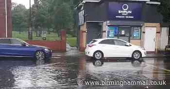 Drivers warned as busy city road flooded amid storm