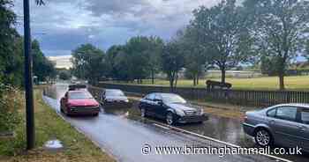 Cops slam drivers ploughing through closed flooded roads