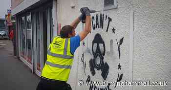 Workman covers 'I can't breathe' mural - weeks after council 'whitewashing'