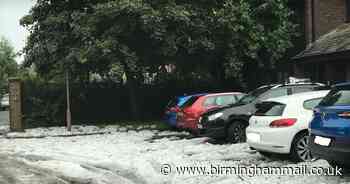 June or January? Ground turns white as freak storm batters region