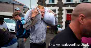 Residents fill pillowcases with sand in attempt to keep out floods