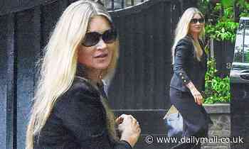 Kate Moss wears black flared suit during lockdown outing