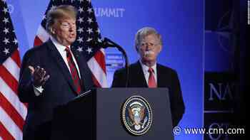 Trump signs Uyghur human rights bill on same day Bolton alleges he told Xi to proceed with detention camps