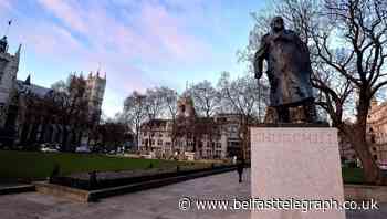 Churchill statue uncovered ahead of French president’s visit