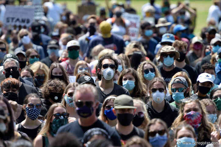 Californians required to wear masks in most public settings, Newsom says
