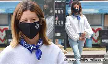 Ashley Tisdale wears face mask and billowing top on LA walk