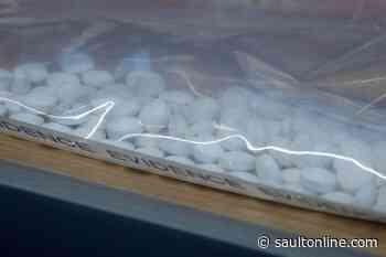 Police seize more than 120,000 fentanyl pills in multiple drug raids