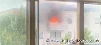Shocking photos show moment flat caught fire in Harrow