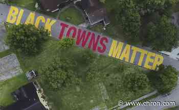 'Black Towns Matter' mural painted on street in Houston's Independence Heights