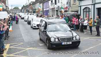 Hundreds line streets to pay respects to murdered guard