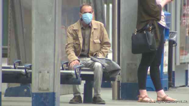 Alberta premier recommends masks, but backs away from law requiring them