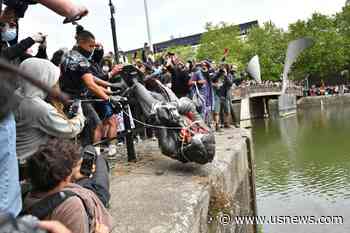 Watery End for Statue of Slave Trader in UK City of Bristol - U.S. News & World Report