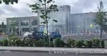 Why smoke billowed from Next store at Gallagher Retail Park