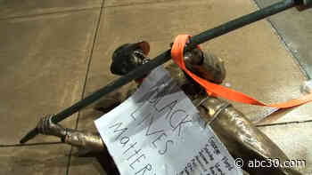 Demonstrators topple 2 Confederate monument statues outside NC Capitol building on Juneteenth