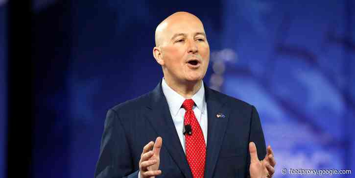 A Republican governor is threatening to withhold $100 million in federal relief funds from cities if local officials mandate wearing masks in public buildings