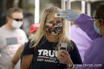 Metal barriers, Trump gear: Crowd readies for Tulsa rally