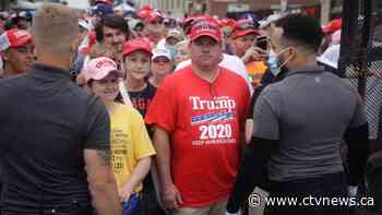 Metal barriers, Trump gear: Crowd readies for Tulsa rally